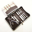 Piezas de acero inoxidable por mayor PU cuero caso 8 Top grado juego Nail Clippers